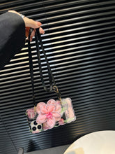 Load image into Gallery viewer, Icy Black Pink Flower Wristband iPhone Case with Messenger Strap
